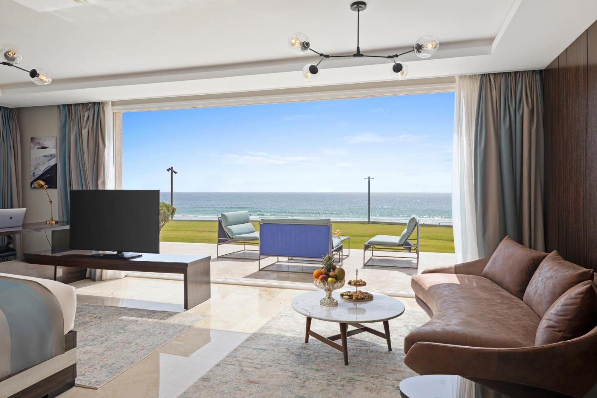 Pickalbatros White Beach Taghazout (Adults Only) Eksteriør billede A living room in a luxury apartment